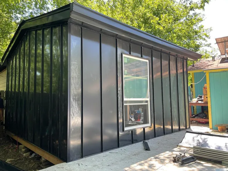 Black standing seam metal wall panels for Metal Roof Installation in Exeter